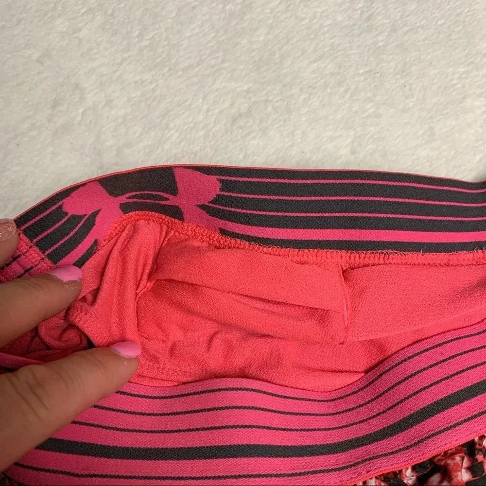 Under Armour pink running shorts size S heat gear